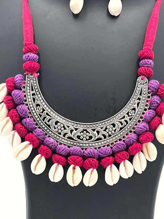 The Chakmak Rang Tarang – Magenta & Purple Thread Necklace Set with Oxidized Crescent Pendant and Cowrie Shells