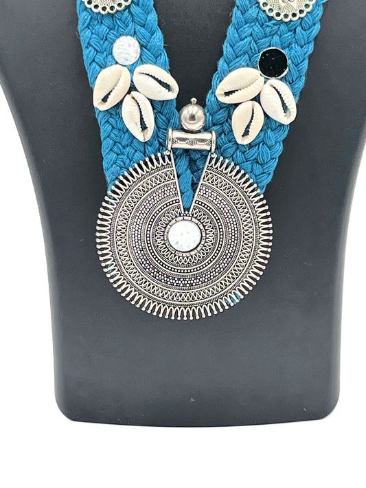 Oxidized silver round tribal pendant with teal blue thread and cowrie shells – Handmade Necklace by The Chakmak