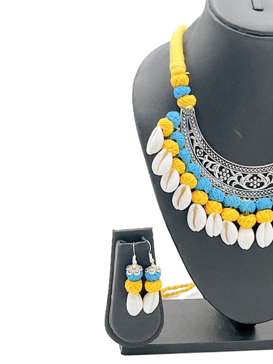 Handcrafted Yellow & Blue Thread Cowrie Shell Earrings with Oxidized Detailing – The Chakmak Rang Tarang Collection