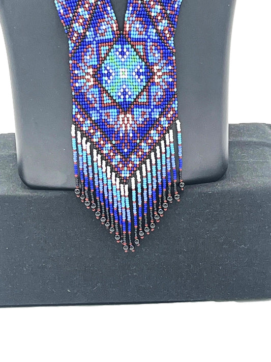 Close-up of Blue Tribal Beaded Necklace Pendant – The Chakmak