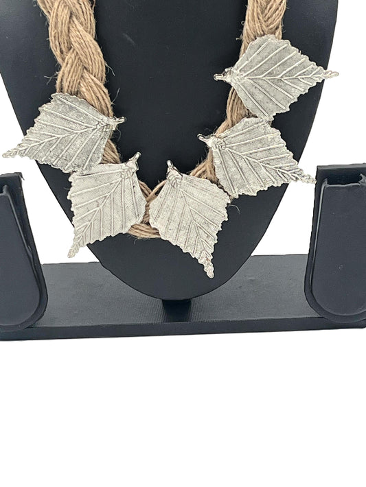 Close-up view of oxidized leaf pendant necklace – The Chakmak