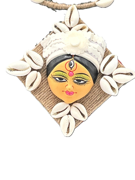 Close-up of Handcrafted Devi Pendant with Cowrie Shell Frame – The Chakmak Shakti Series