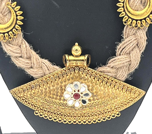 Close-up view of Surya Saaj Necklace with Floral Gold Pendant – The Chakmak