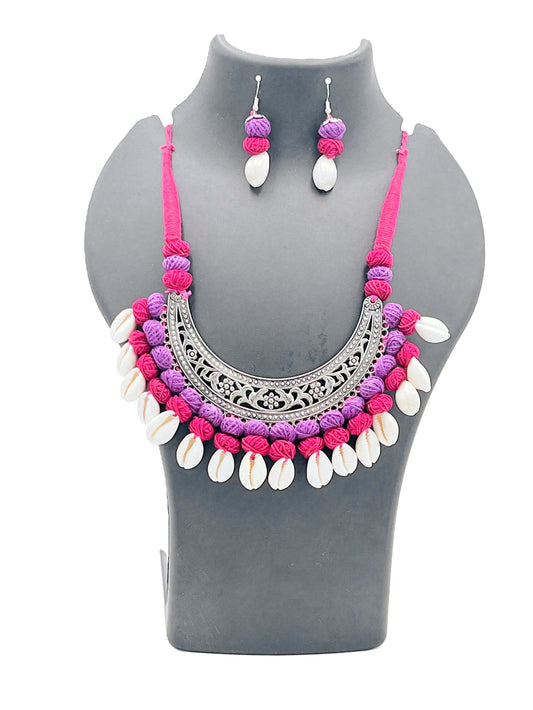 The Chakmak Rang Tarang – Magenta & Purple Thread Necklace Set with Oxidized Crescent Pendant and Cowrie Shells