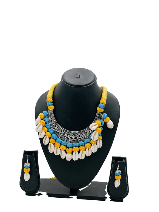 The Chakmak Rang Tarang Yellow & Blue Thread Shell Necklace Set with Oxidized Pendant and Matching Earrings – Handmade Festival Jewelry