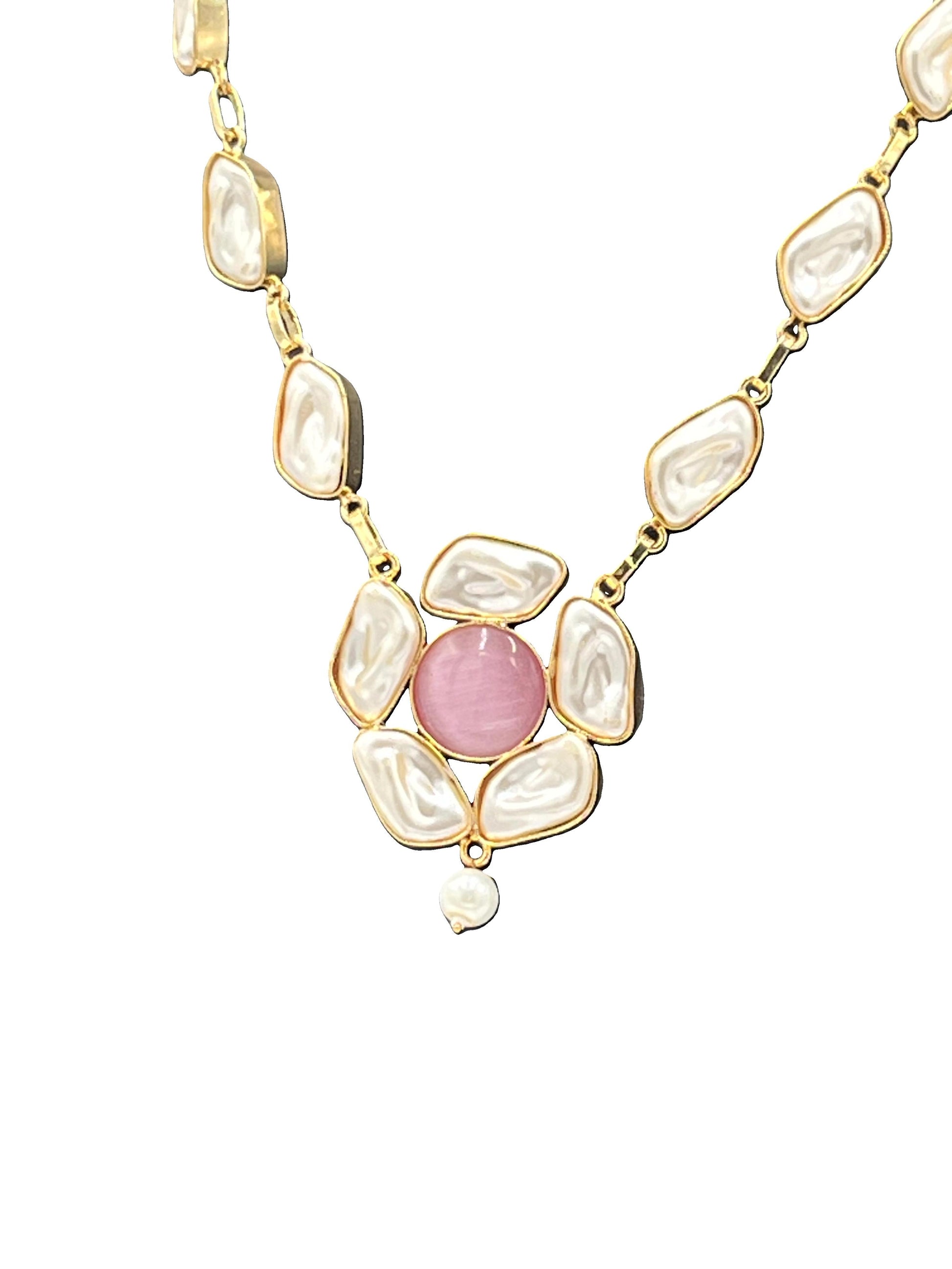 Close-up of blush pink centerpiece pendant with pearl drop – The Chakmak