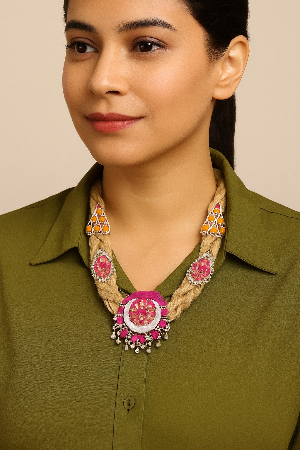 Model wearing handcrafted ethnic jute necklace with pink stones