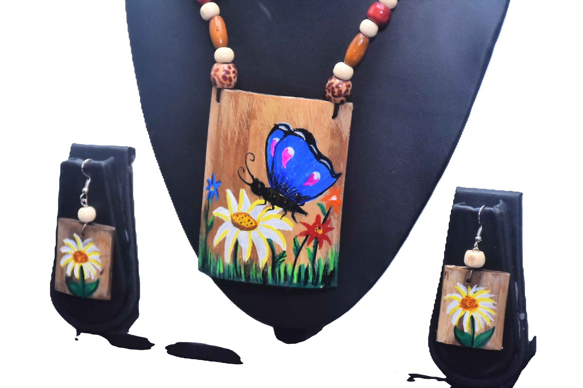 Necklace with wooden pendant featuring a butterfly and flowers, accompanied by matching earrings-Bamboo Jewelery by The Chakmak