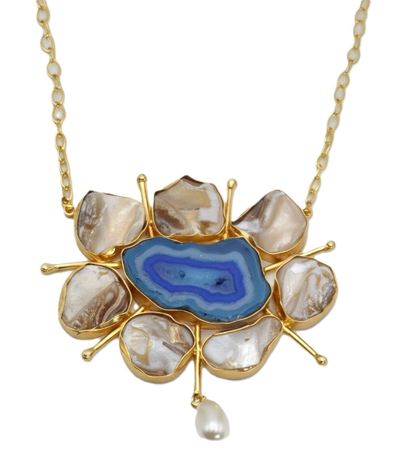 Close-up of handcrafted royal blue agate floral pendant with pearl drop – The Chakmak