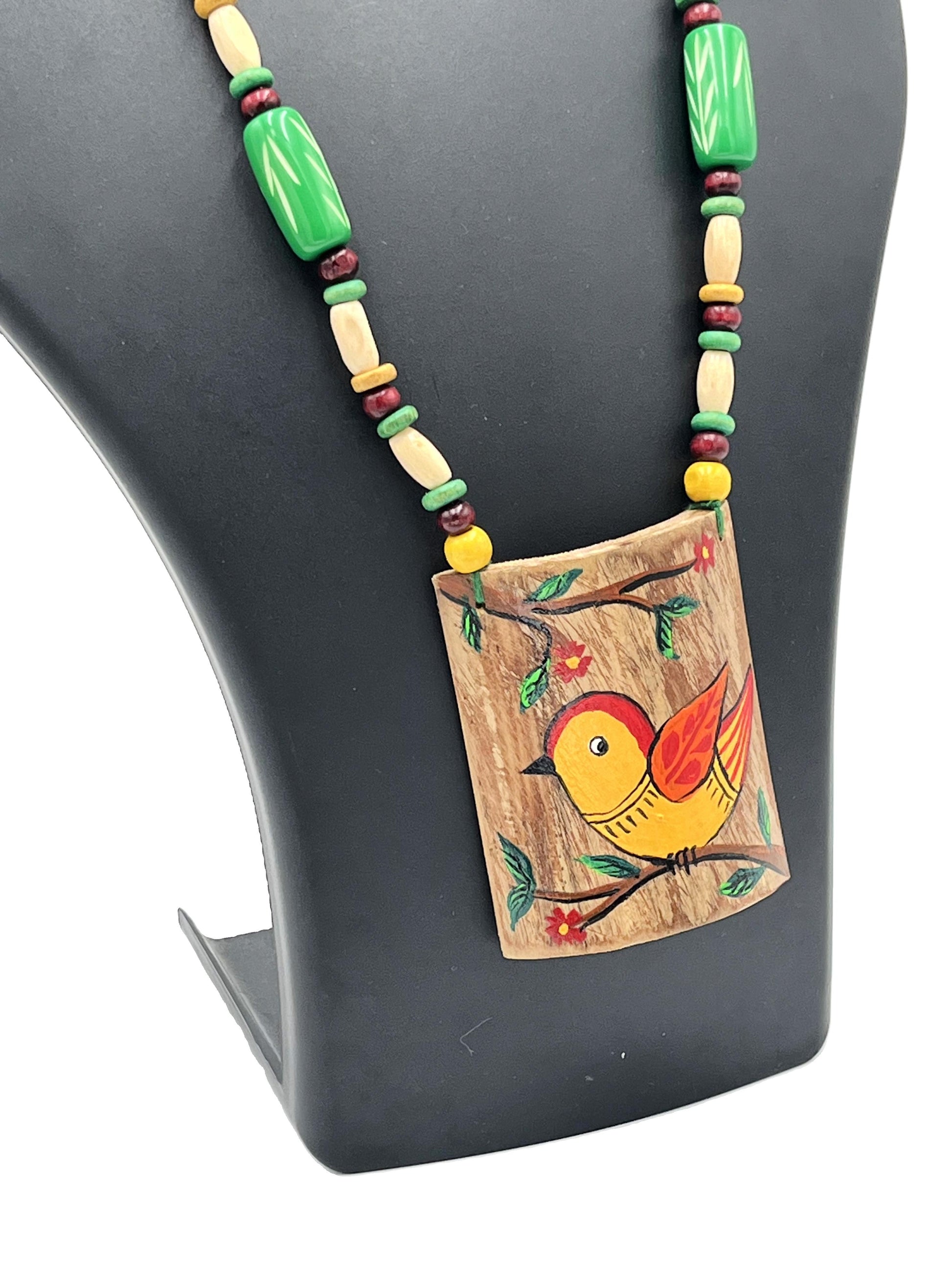 lose-up of Bamboo Pendant with Yellow Bird & Flowers – The Chakmak