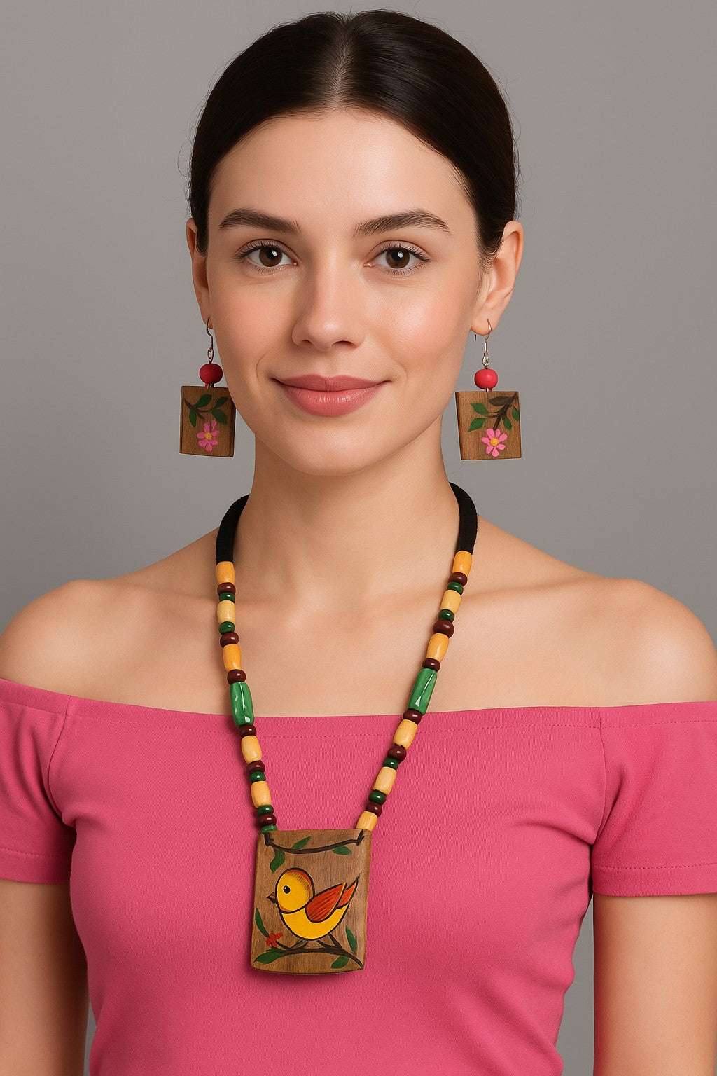 Model wearing Hand-Painted Bamboo Bird Pendant Necklace & Earrings – The Chakmak