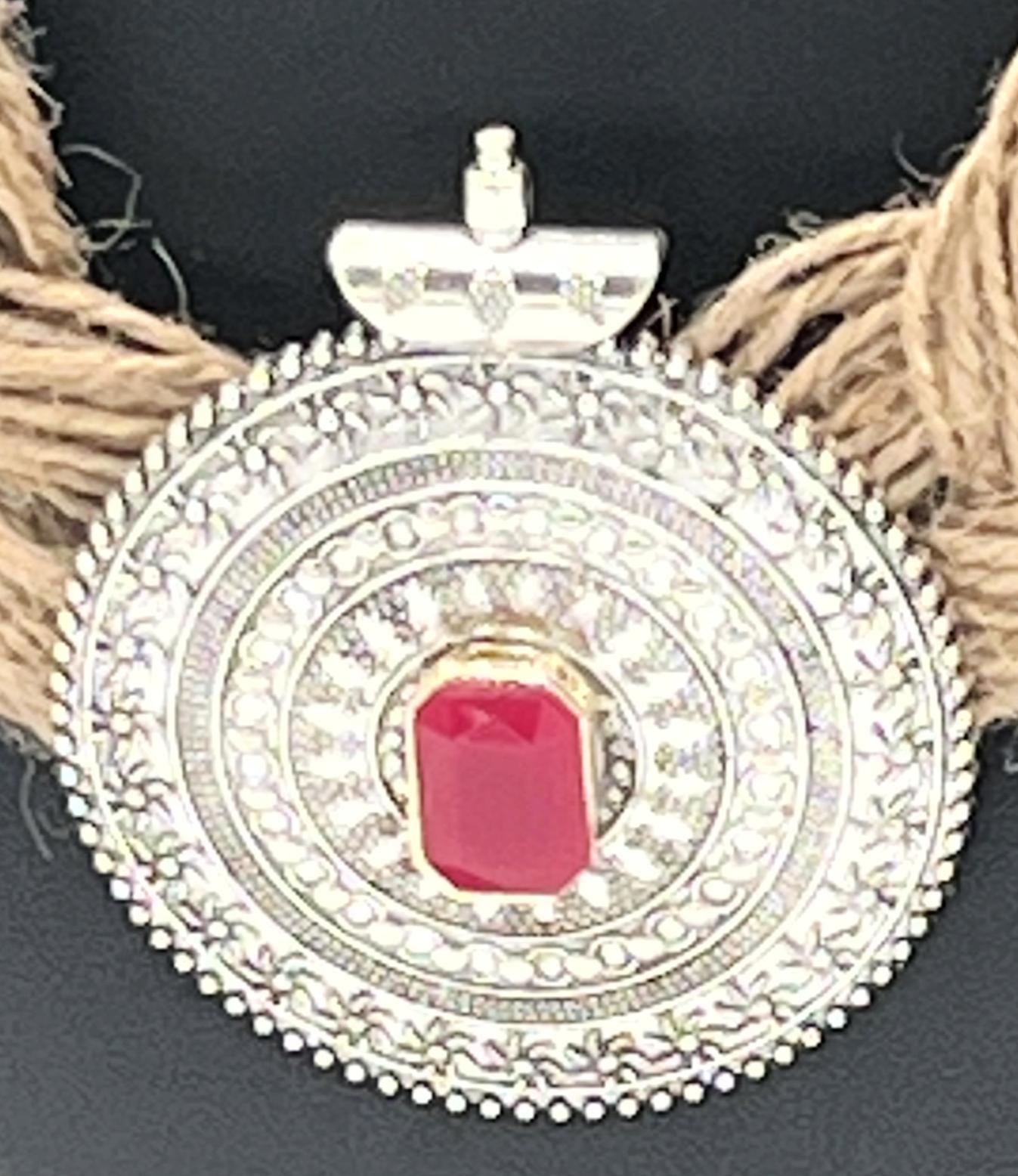 Close-up of oxidised silver motif and red stone pendant – The Chakmak Tribal Grace Necklace