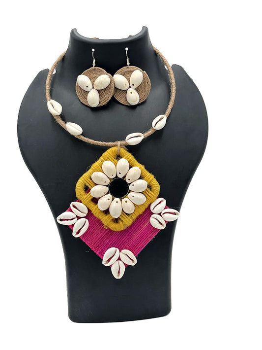 Discover The Chakmak Shankh Tara Gulmohar Glow Edition – a handmade Pink & Mustard Cowrie Shell Necklace Set with earrings. Perfect for festivals & weddings.